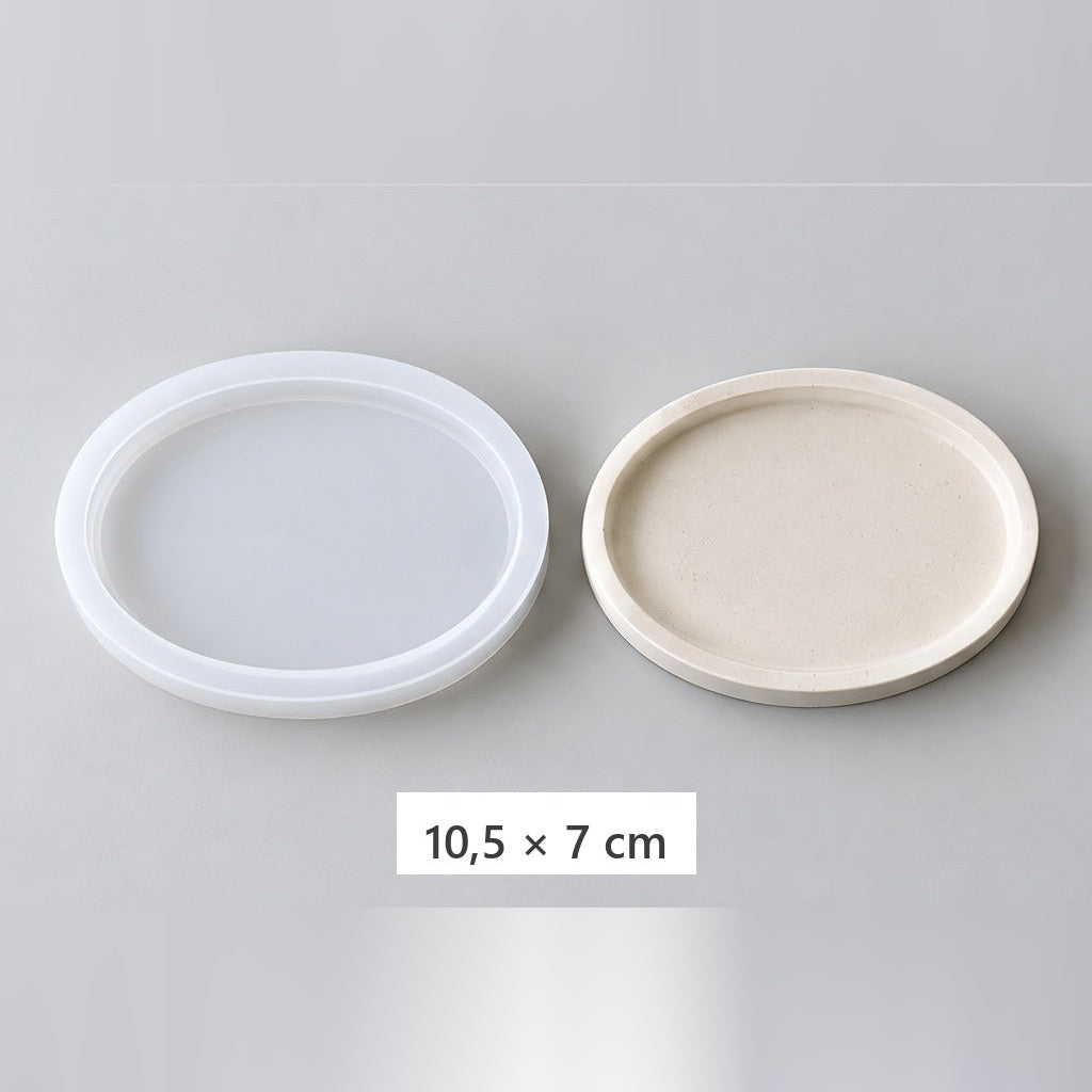 Pružná silikonová forma na odlévání podnosů a podtácků – oválná podložka – 10,5 × 7 cm